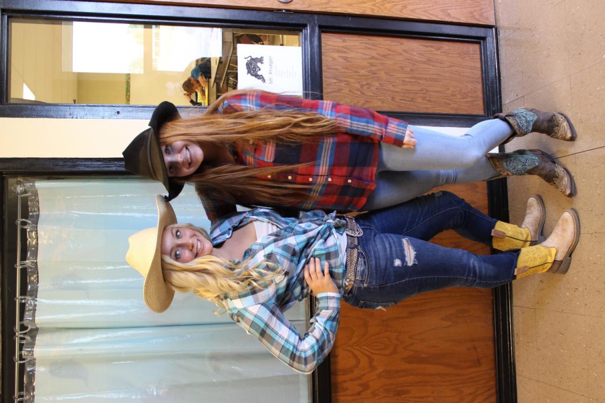Bella Simmons and Stella Steck as ranch hands