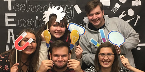 Above: Haley Gilmore, Abbie White, Connor DeFrancesco, Justin Rhodes, and Allie Pickert having a blast at STEAM.