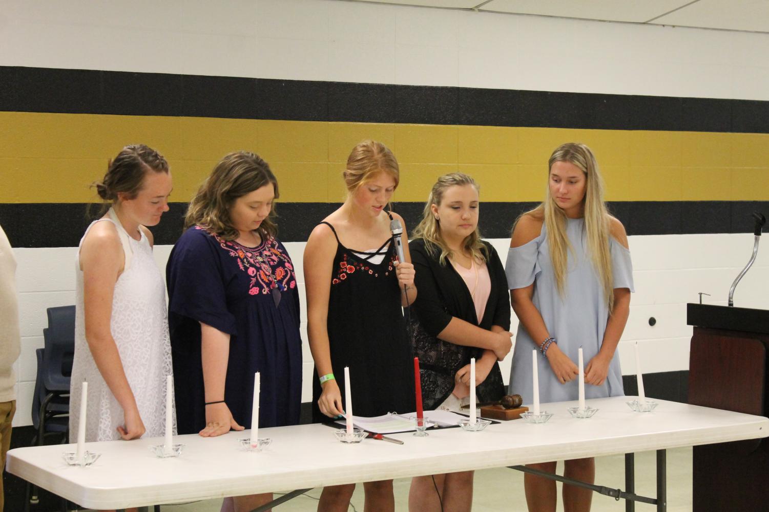 Former and new FCCLA officers come together at the banquet. From left to right, the members are Mallory Mathes, Malyn Adams, Marrissa Hale, Schanda Racer, and Evann Davis.