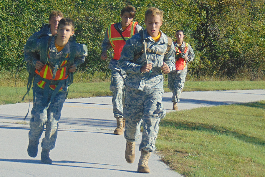 Caleb Cooper and Blake Olson lead out on the 10k run. Team members Jerritt Hargis, Caileb Queener, and Levi Barlow must also finish before the team's time is called. Jeff Wilson, Aaron Cooper, Levi Cooper were also running, but they are not pictured here.