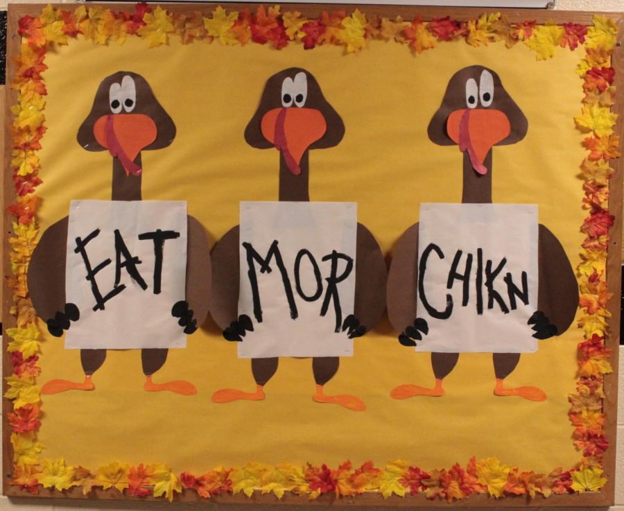 StuCo+cooks+up+a+twist+on+a+favorite+restaurants+ad+for+their+Thanksgiving+bulletin+board+design.+
