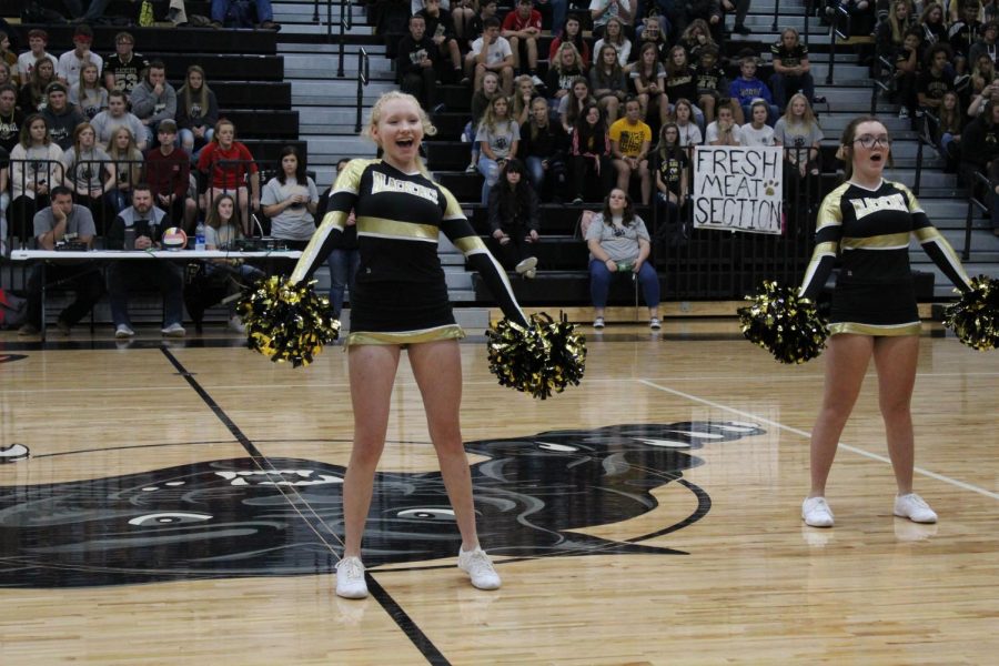 The cheer squad dancing to the song Pom Poms by the Jonas Brothers