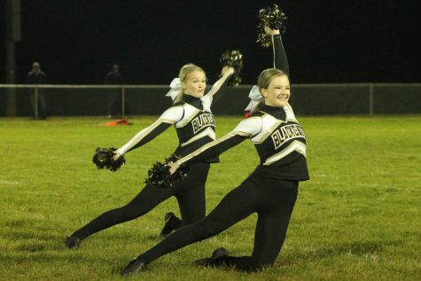 Mackenzie Rice (12) and Maddie Jennings (11) preforming during Football Homecoming