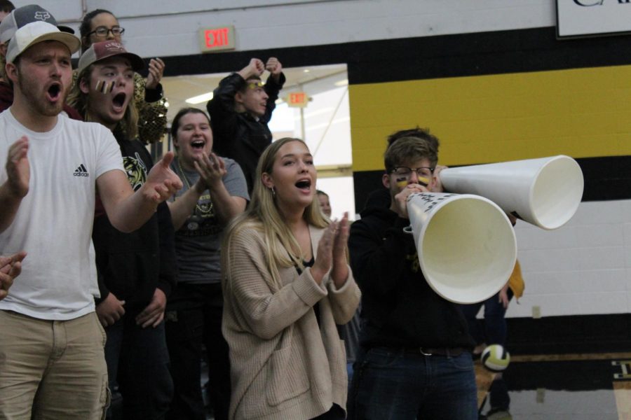 The seniors cheering very energetically. 