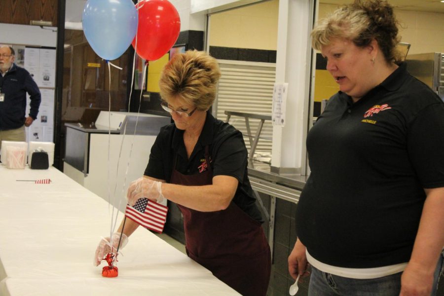 The lunch ladies decorating for the veterans.  