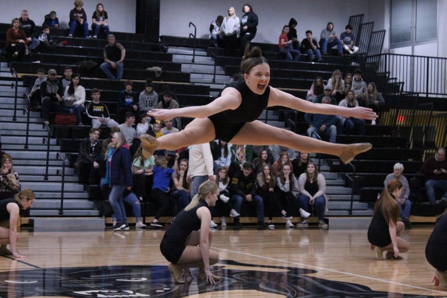 Welcome to the Jungle was incorporated with many moves and stunts that amazed the viewers. Mackenzie Rice does an incredible toe touch while simultaneously winking at the crowd, followed by other members of her team also doing something special to add to the piece.