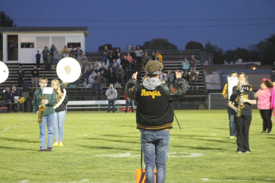 Jerritt Hargis directing the band during their halftime performance.