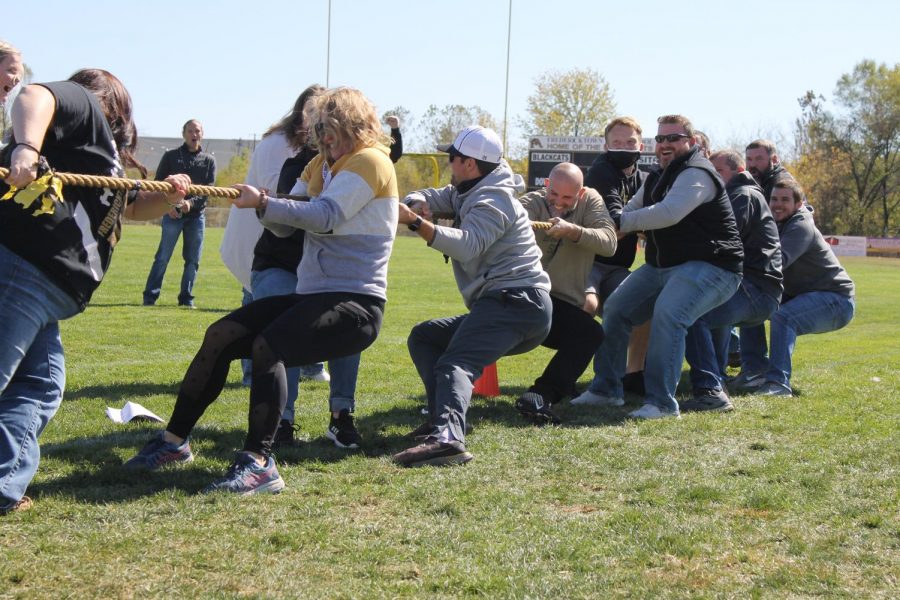 The teacher team during the tug of war competition, amazingly taking on the football team and winning!