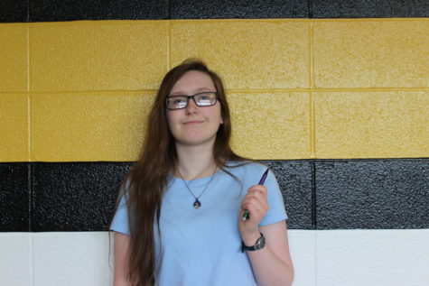 Author, Abi Stookey (11), posing for a picture with her favorite pencil. 