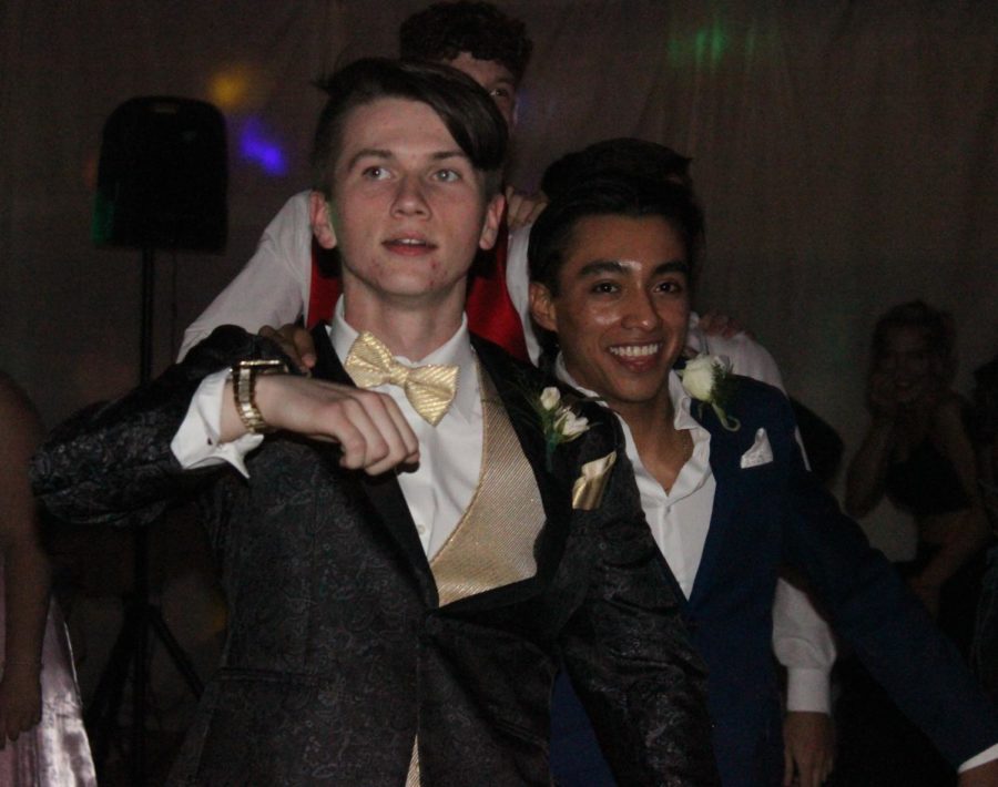 Senior students Austin Wagganer and Ruben Benitez wrapped up in the conga line that formed at one point in the night, and remained for several minutes.