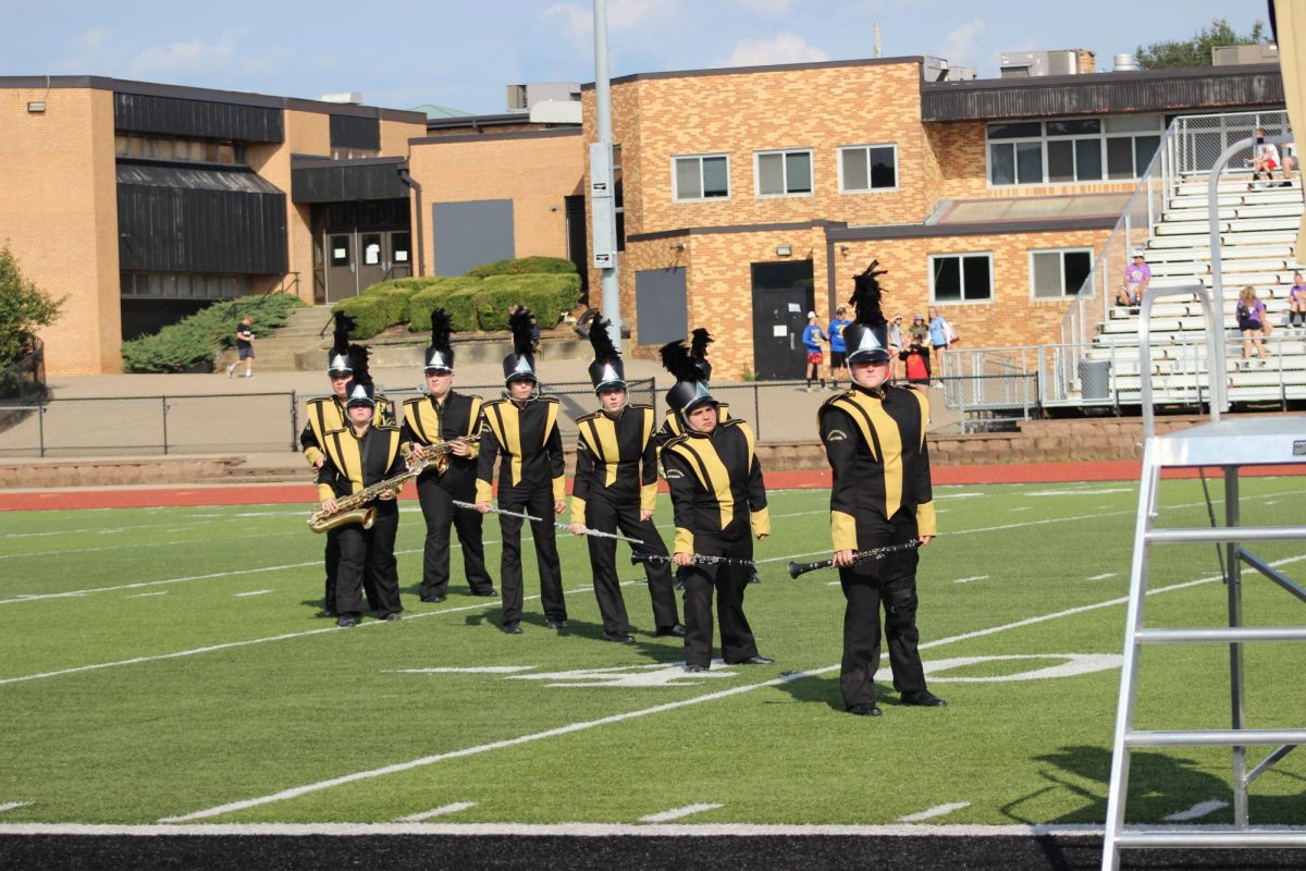 Clarinets and saxophones doing their end pose for Goofy Goober Rock.
