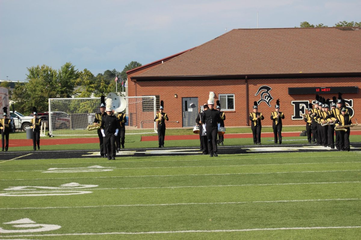 The band starting their march on field for the competition performance.