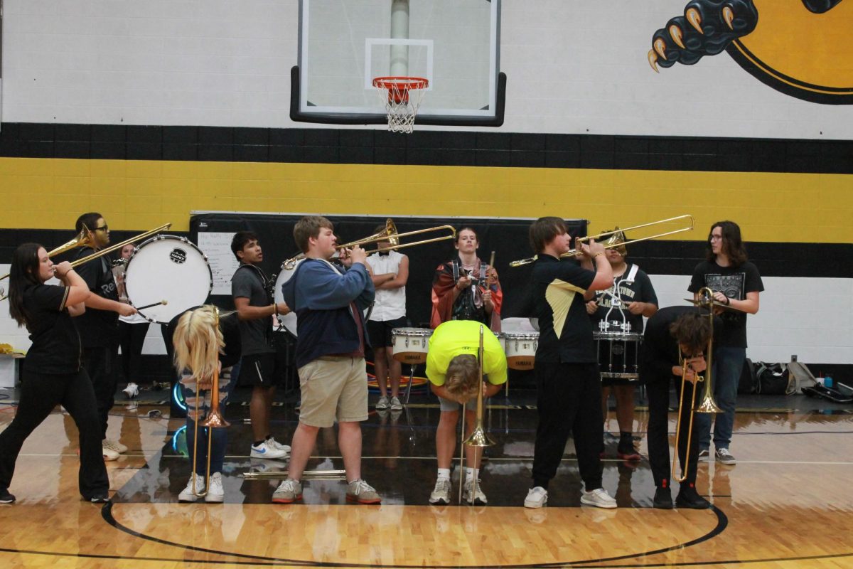 The Marching Band bone squad performed their show after the full Marching Band was introduced. 