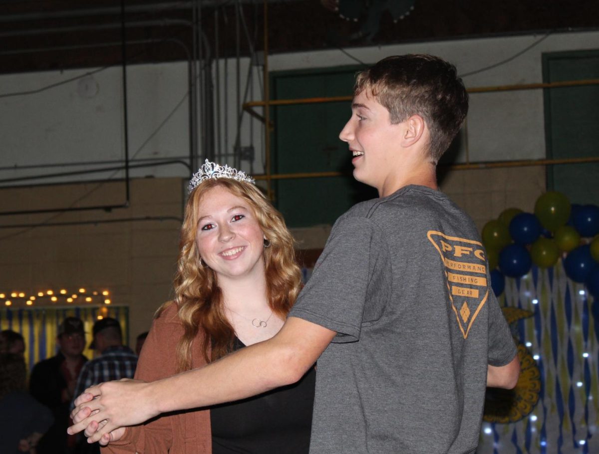 Addie and Caleb keeping up traditions and completing the king and queen dance.
