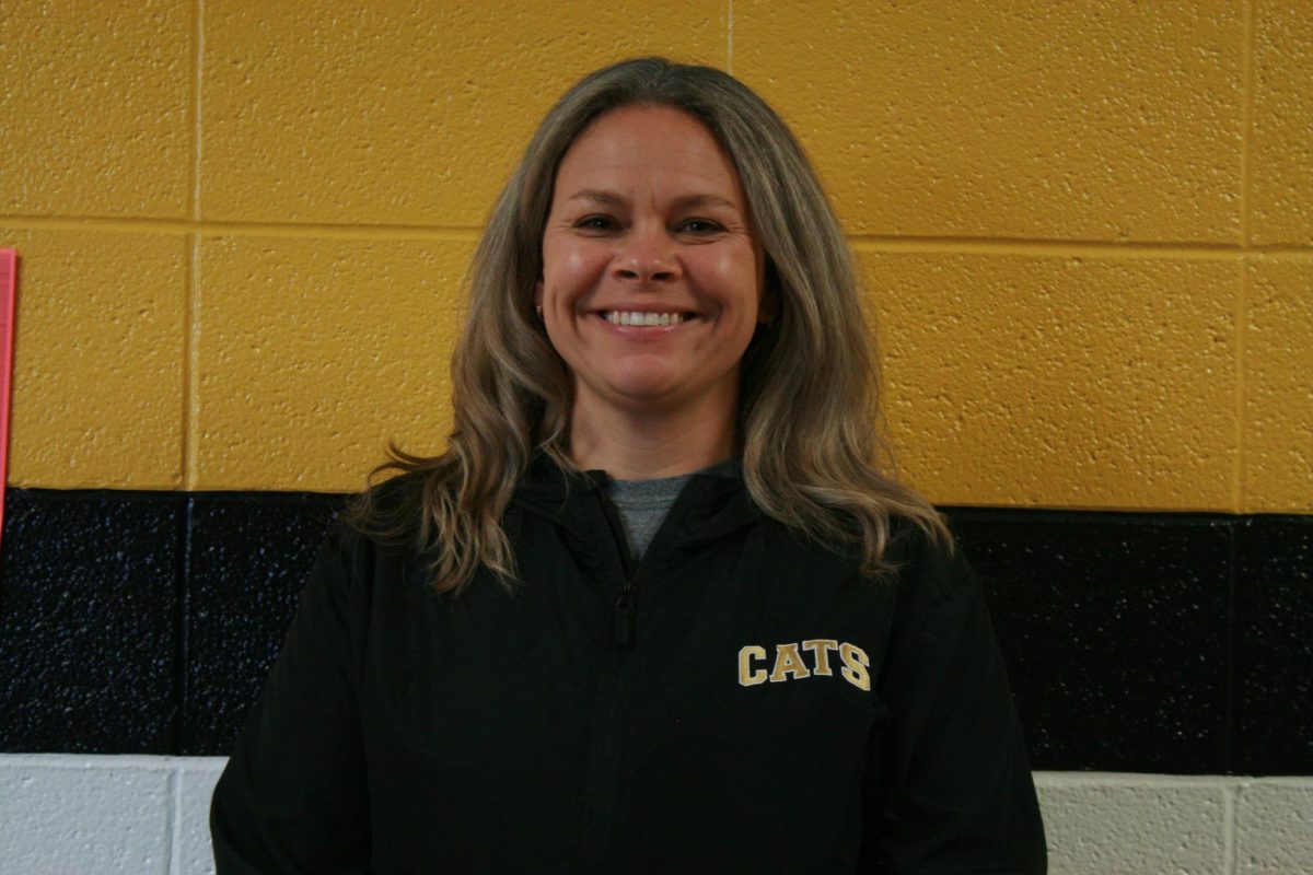 Mrs.+Reutzel%2C+showing+her+FHS+spirit+by+participating+in+Black+and+Gold+Day.