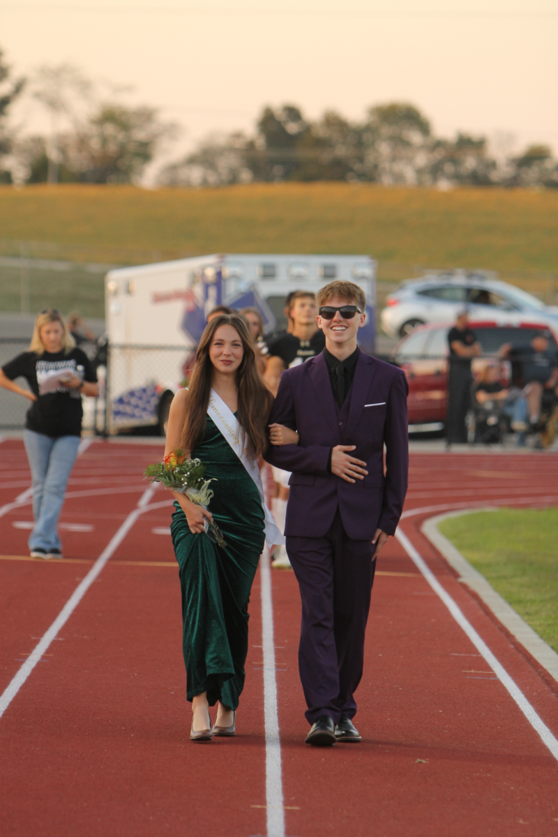 The first seniors to walk, Haley Tucker and Ethan Vance. 