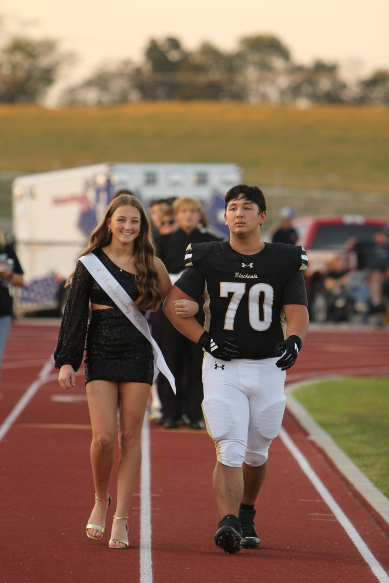 Sophomores Maggie Wood and Maddox Knepper on the track for homecoming. 