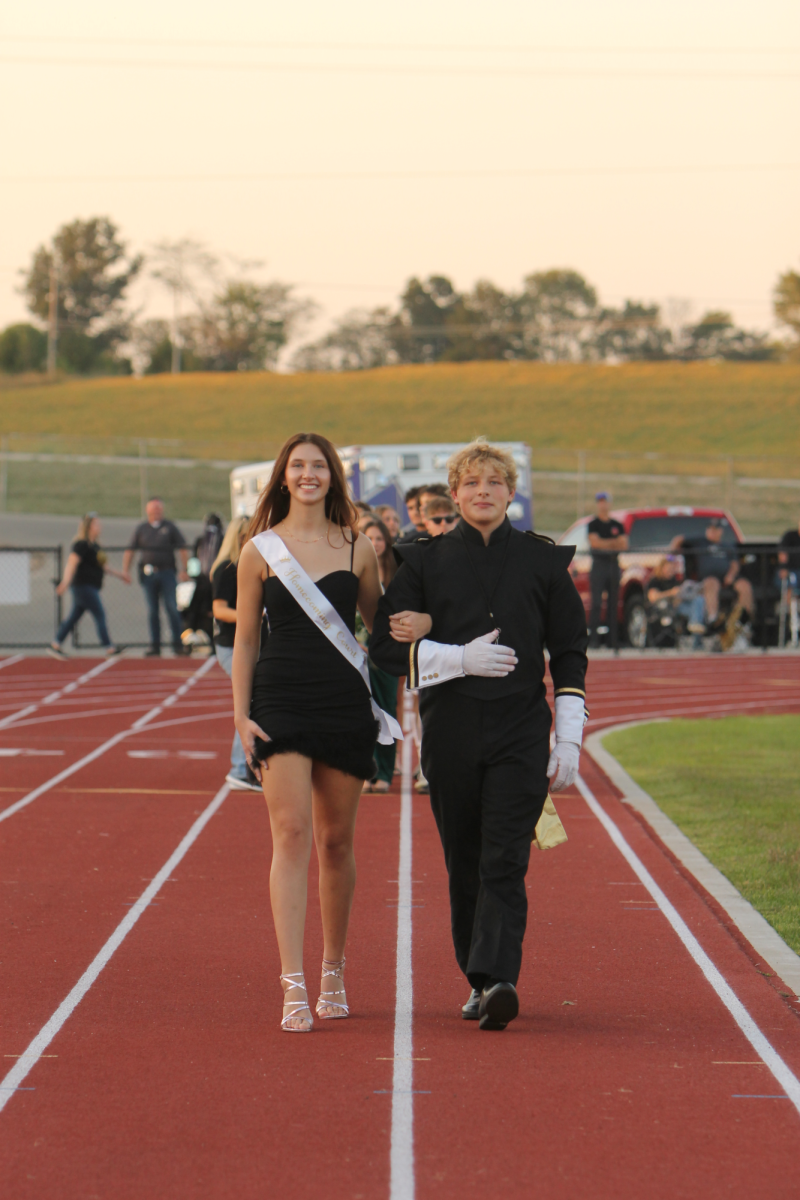 Juniors Sydney Dunahoo and Carter Hale making their way in front of the crowds.