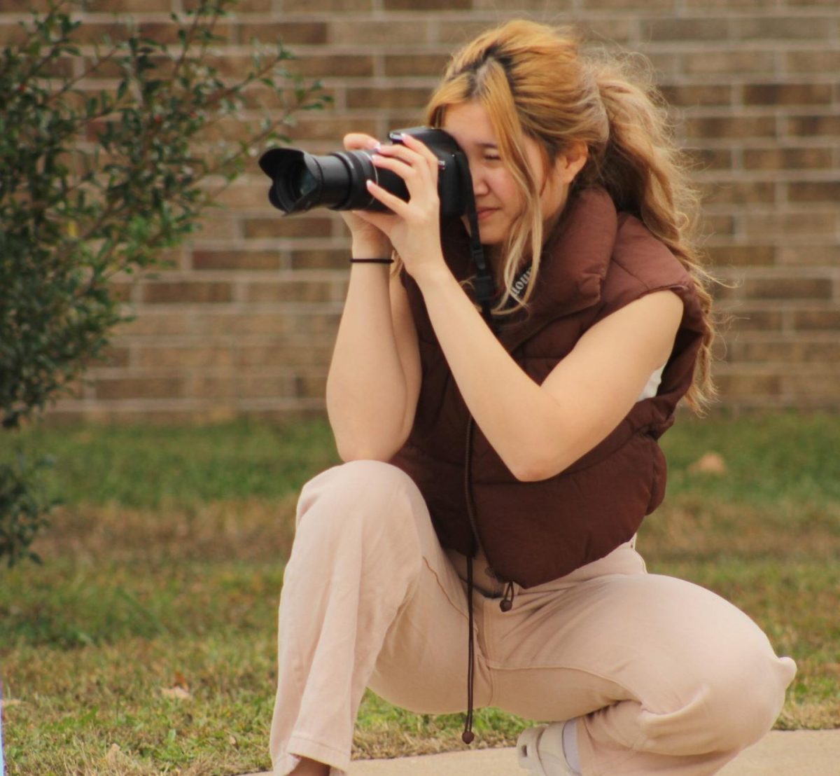 Linda Yang in action, taking photos for the Veterans' Day parade