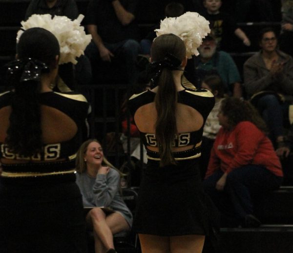 Callie Rice (12) and Brittany Avalos (10) preparing to perform at the Fredericktown vs. Bismark game.