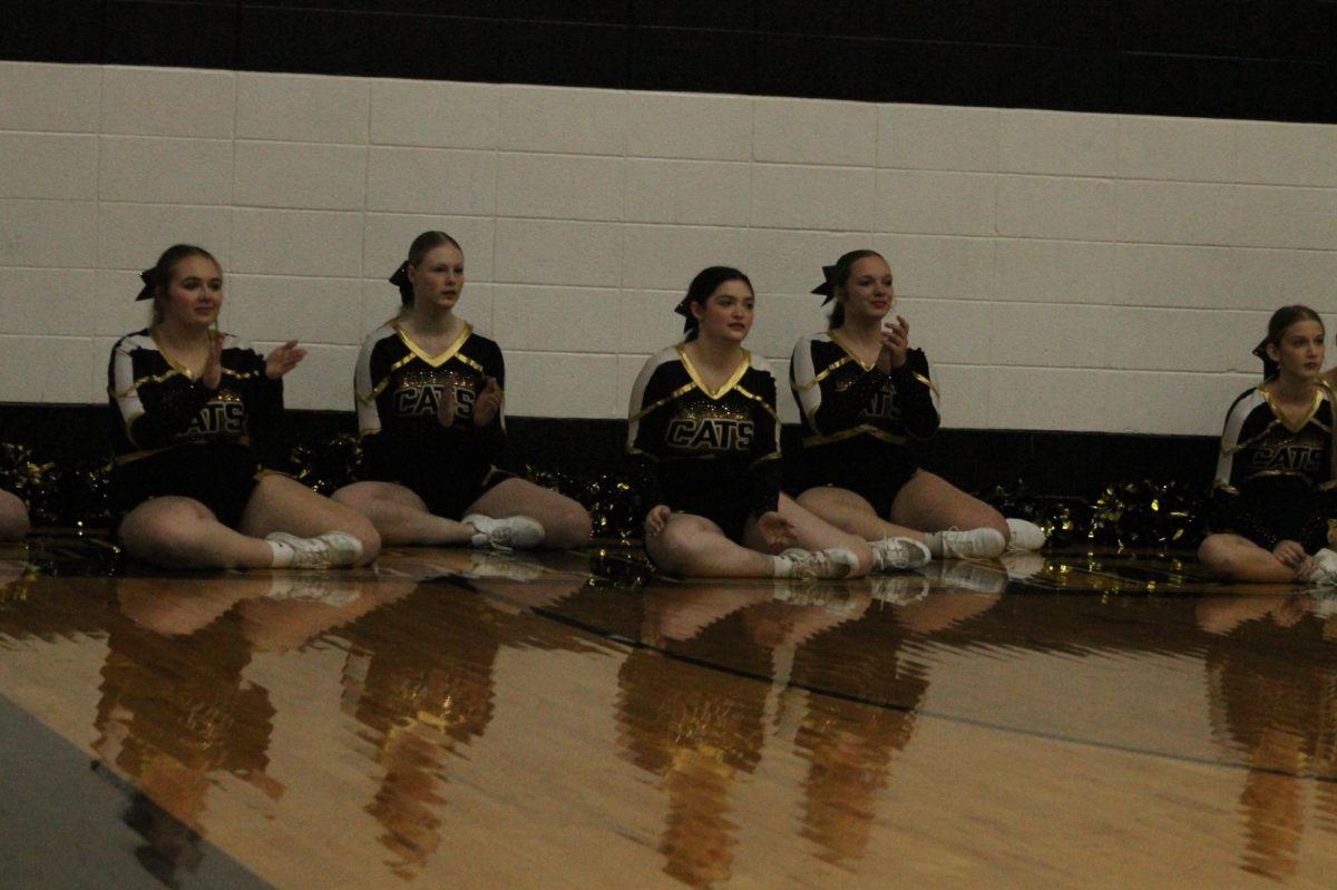 Cheerleaders Maggie Gallagher (11), Keishah Sisk (10), Jayden Jenkins (12), Izzabella Lee (9), and Zoie Kraemer (9)