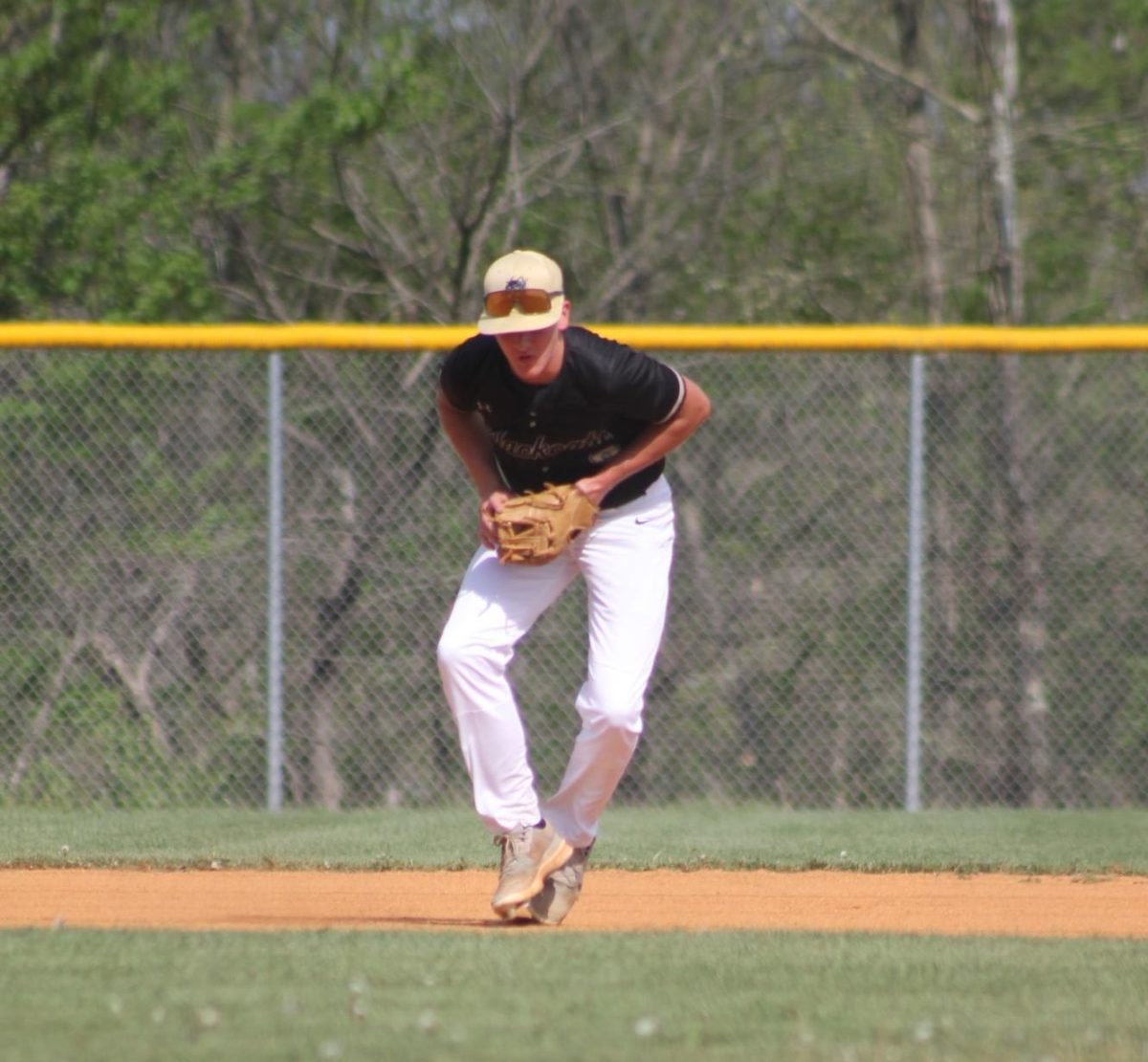Senior Mason Proffer catching a ball.